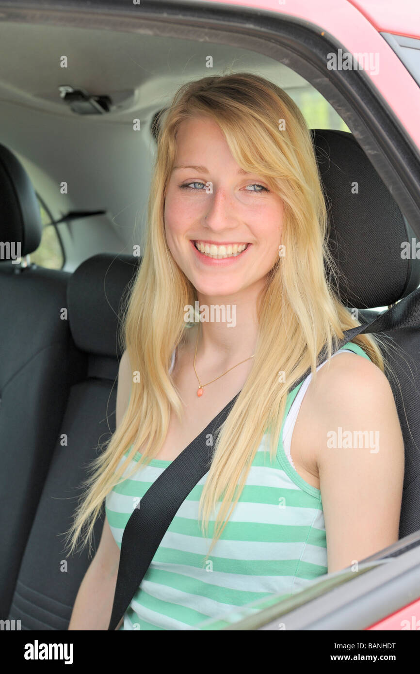 Teen girl in back seat