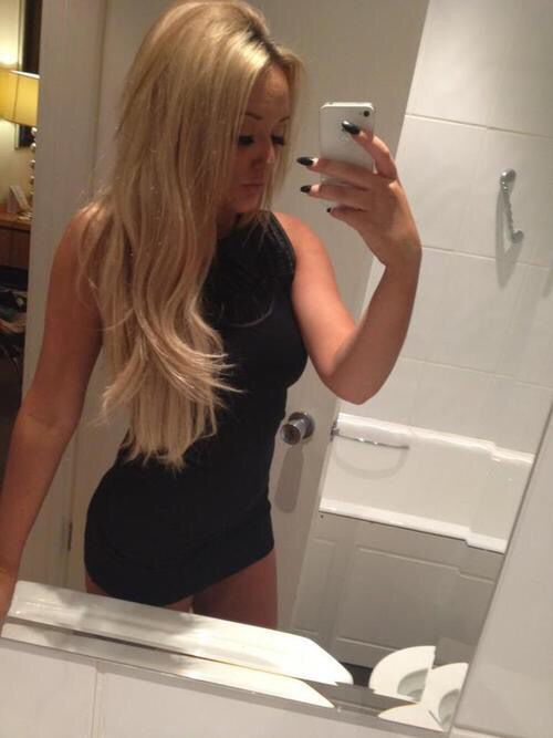 Hot blonde girl mirror selfie