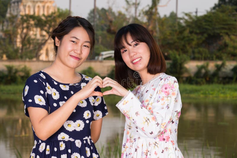 Young asian girls making love
