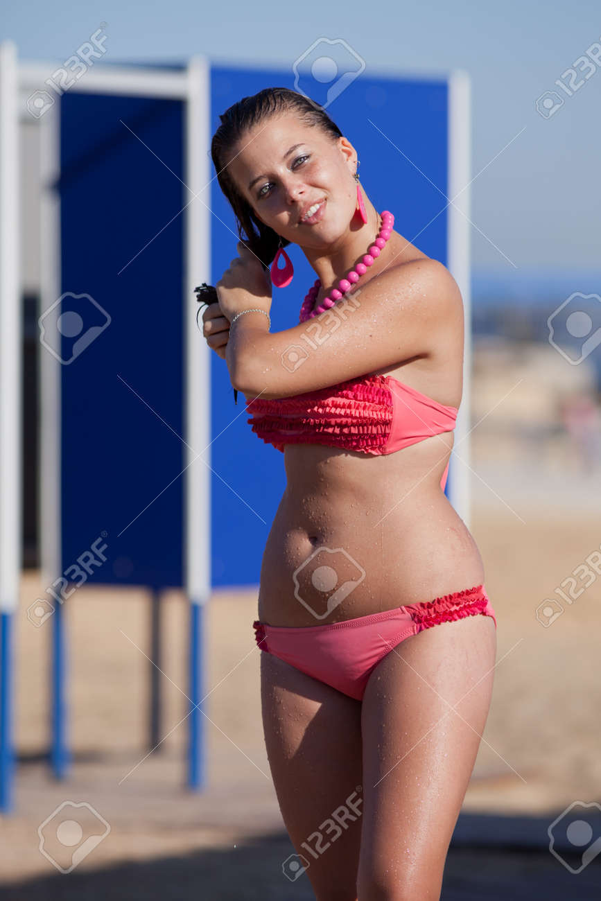 Young chubby girl on beach