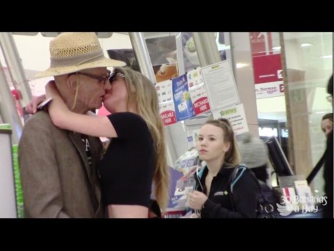 Teen girl kissing older woman