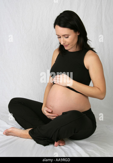 Pregnant woman kneeling