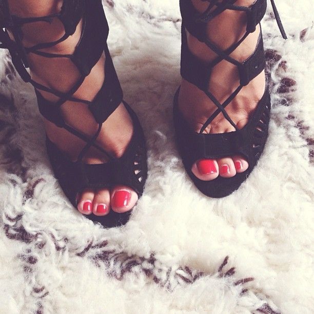 Black girl feet in sandals